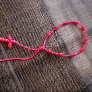 Pink Knotted Rosary Cross Bracelet